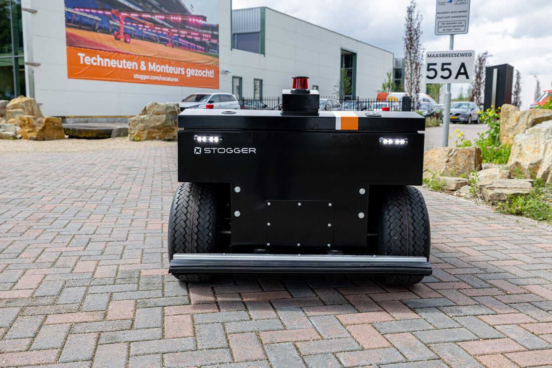 Stogger Nova autonomous service robot in front of the Stogger building